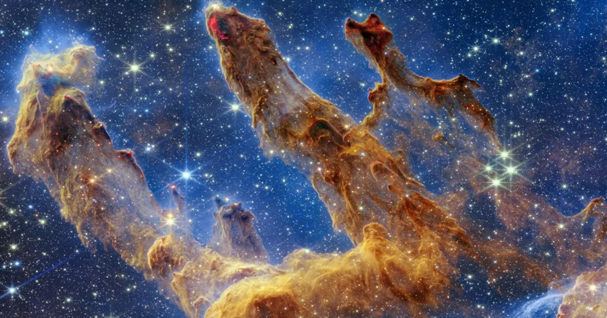 A stunning image captured by the James Webb Space Telescope showcasing the iconic Pillars of Creation. The image reveals towering columns of gas and dust within the Eagle Nebula, forming intricate shapes against the backdrop of a cosmic expanse. The vivid colors and intricate details offer a glimpse into the breathtaking beauty of our universe.